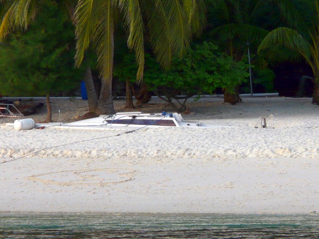 Rawa sailboat buried on beach